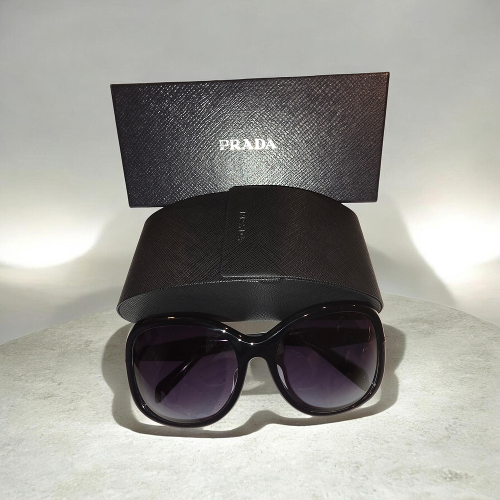 Prada Women's Black Frame Sunglasses with Dark Gray Gradient Lenses